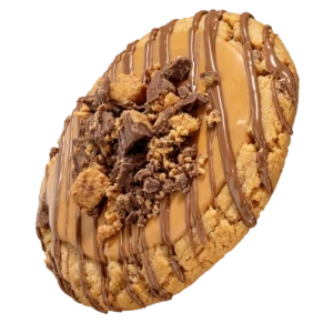 Crumbl Peanut Butter Cup Cookie with peanut butter topping and chocolate cups
